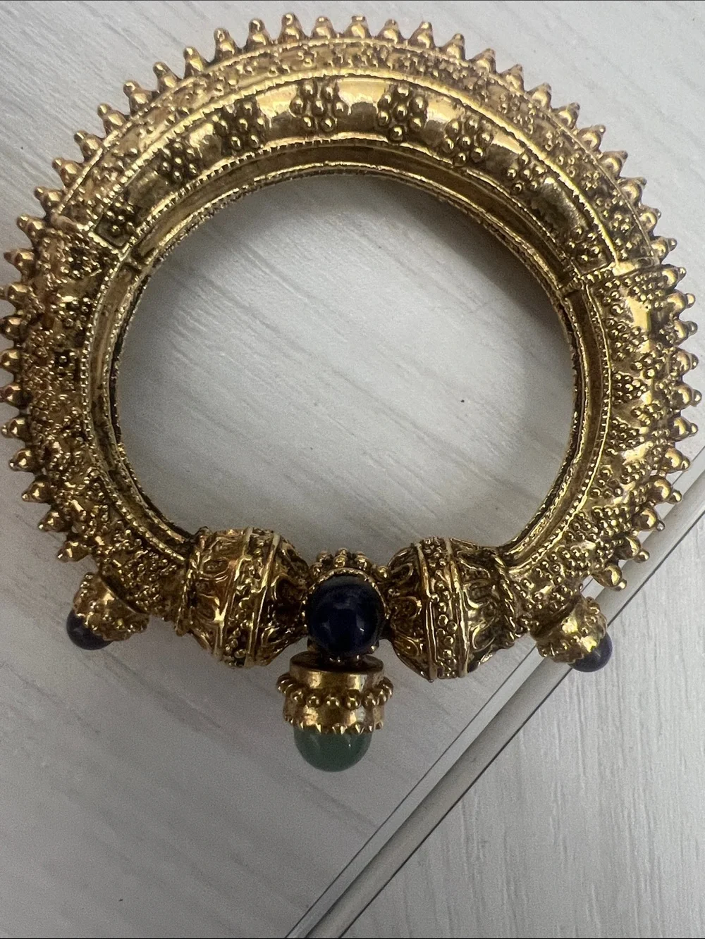 Gold-Tone Textured Hinged Bangle with Blue & Green Cabochons